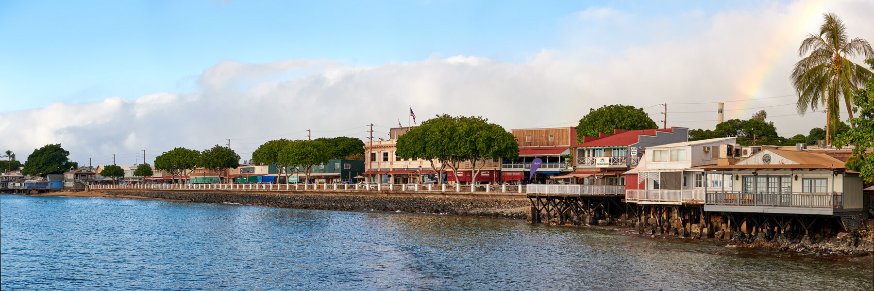 Front Street Lahaina before the fire, crowded with shops and the historic banyan tree